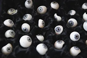 Prosthetic eyeballs are seen in a carrying case during a measuring session for the Prosthetic eyeballs are seen in a carrying case during a measuring session for the