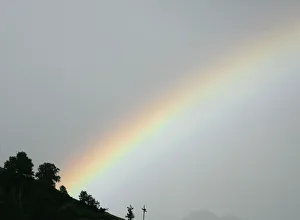 A rainbow is pictured during a rain shower near Bettmeralp A rainbow is pictured during a rain shower near Bettmeralp