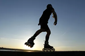 A rollerblader wears shorts during a spring-like day at Vancouvers English Bay during A rollerblader wears shorts during a spring-like day at Vancouvers English Bay during