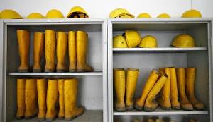 Rubber boots and helmets are stored for visitors at the construction site of the new Rubber boots and helmets are stored for visitors at the construction site of the new