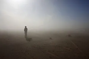 A Sahrawi man stands in the Sahara desert between Tindouf and Tifariti A Sahrawi man stands in the Sahara desert between Tindouf and Tifariti