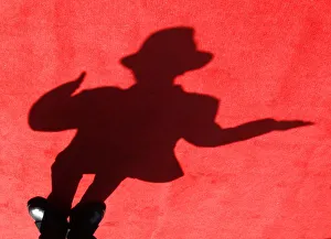 A shadow of a dancer impersonating Michael Jackson is cast on the red carpet during A shadow of a dancer impersonating Michael Jackson is cast on the red carpet during