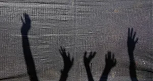 Shadows of the arms of supporters of Indonesian presidential candidate Sukarnoputri Shadows of the arms of supporters of Indonesian presidential candidate Sukarnoputri
