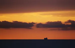 A ship is seen on the horizon of the Atlantic ocean, in Havana A ship is seen on the horizon of the Atlantic ocean, in Havana