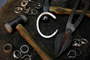Silver jewellery parts and work tools are seen in the workshop of goldsmith Gavriel Silver jewellery parts and work tools are seen in the workshop of goldsmith Gavriel