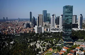Skyscrapers of banks headquarters and popular shopping malls are pictured next to the Skyscrapers of banks headquarters and popular shopping malls are pictured next to the