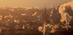 Smoke billows over the rooftops of downtown Prague Smoke billows over the rooftops of downtown Prague