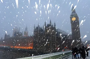 Snow falls around The Houses of Parliament in central London Snow falls around The Houses of Parliament in central London