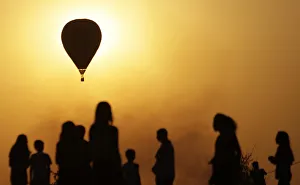 Spectators look at contestants competing in the National Ballooning Championship Spectators look at contestants competing in the National Ballooning Championship