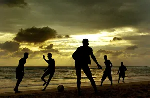 SRI LANKAN CHILDREN PLAY FOOTBALL ON BEACH AT UNAWATUNA SRI LANKAN CHILDREN PLAY FOOTBALL ON BEACH AT UNAWATUNA