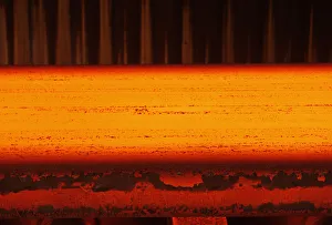 A steel slab leaves a continuous caster at German steel manufacturer Salzgitter AG A steel slab leaves a continuous caster at German steel manufacturer Salzgitter AG