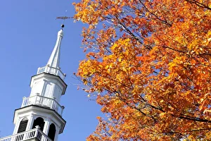The steeple of The First Congregational Church is juxtaposed with fall colors in Sharon The steeple of The First Congregational Church is juxtaposed with fall colors in Sharon