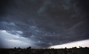 A storm cloud begins to dump rain as it passes over the Brooklyn borough of New York A storm cloud begins to dump rain as it passes over the Brooklyn borough of New York