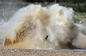 A tank drives through water obstacle on course of Tank Biathlon world championship in A tank drives through water obstacle on course of Tank Biathlon world championship in