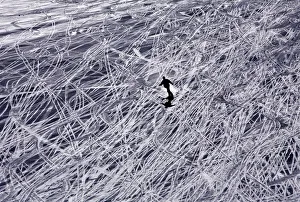 A tourist skis down Maso Corto mountain in Italy A tourist skis down Maso Corto mountain in Italy