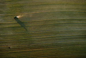 A tractor travels in a field near Donana Natural Reserve, southwest Spain A tractor travels in a field near Donana Natural Reserve, southwest Spain