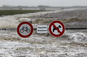 Traffic signs are seen on the North Sea beach near the town of Norddeich Traffic signs are seen on the North Sea beach near the town of Norddeich