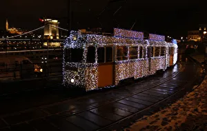 A tram decorated with Christmas lights travels in the centre of Budapest A tram decorated with Christmas lights travels in the centre of Budapest