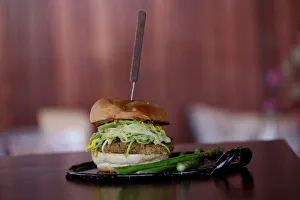 Vegan oat and chickpeas hamburger is pictured at Tasty Beet Juicy Vegan oat and chickpeas hamburger is pictured at Tasty Beet Juicy