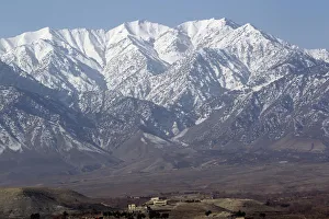 A village near the U.S militarys Forward Operating Base Connolly is seen below a A village near the U.S militarys Forward Operating Base Connolly is seen below a