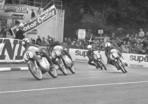 50cc Suzuki action at Quarter Bridge: 1966 50cc TT 50cc Suzuki action at Quarter Bridge: 1966 50cc TT