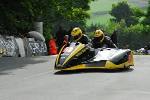Dave Saunders & Grace Bradbury (KCR Suzuki) 2012 Sidecar TT Dave Saunders & Grace Bradbury (KCR Suzuki) 2012 Sidecar TT