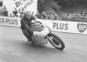 Mike Hailwood winning the 1961 Senior TT Mike Hailwood winning the 1961 Senior TT