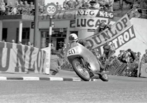 Reg Armstrong at Quarter Bridge: 1954 Lightweight TT Reg Armstrong at Quarter Bridge: 1954 Lightweight TT