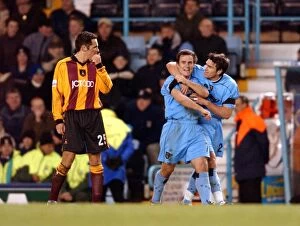 Images Dated 23rd December 2001: Dejected Etherington, Jubilant Edworthy: Coventry City's Triumph Over Bradford City (23-12-2001)