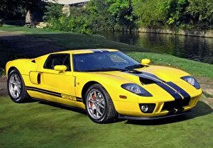 Car photo library/ford/ford ford gt 2005 yellow black stripes Car photo library/ford/ford ford gt 2005 yellow black stripes