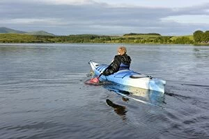 Spring Collection: Boy kayaking on reservoir, Killington Lake, Killington Beck, Cumbria, England, June