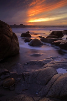 England Coastal Landscapes Prints: View of eroded rock formations on beach at sunset, near Lands End, Cornwall, England