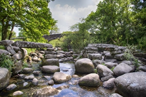 River Dart England Prints: View of river with partially collapsed clapper bridge