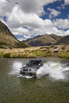 4WD crossing the Mararoa River, near Mavora Lakes, Southland, South Island, New Zealand 4WD crossing the Mararoa River, near Mavora Lakes, Southland, South Island, New Zealand