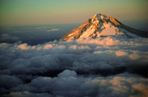 An aerial of Mt Hood, Oregon, peaking above the cloud cover An aerial of Mt Hood, Oregon, peaking above the cloud cover