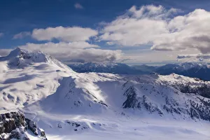 Aerial view with Mount Garibaldi in the foreground, with Howe Sound and Squamish in the background Aerial view with Mount Garibaldi in the foreground, with Howe Sound and Squamish in the background