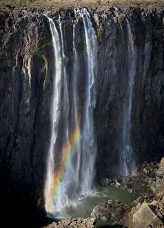 Africa, Zimbabwe, Victoria Falls. Rainbow at Victoria Falls Africa, Zimbabwe, Victoria Falls. Rainbow at Victoria Falls