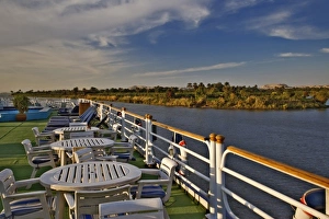 Afternoon view of Nile River from sightseeing boat, near Aswan, Egypt Afternoon view of Nile River from sightseeing boat, near Aswan, Egypt