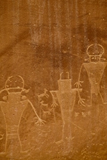 Ancient petroglyphs from the Fremont people on canyon wall at Capitol Reef National Ancient petroglyphs from the Fremont people on canyon wall at Capitol Reef National