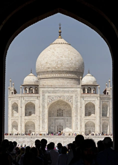Asia, India. Taj Mahal entry gate, the Royal Gate with people in silhouette Asia, India. Taj Mahal entry gate, the Royal Gate with people in silhouette