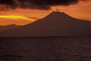 Asia, Papua New Guinea, Kimbe Bay. Volcano at sunset Asia, Papua New Guinea, Kimbe Bay. Volcano at sunset