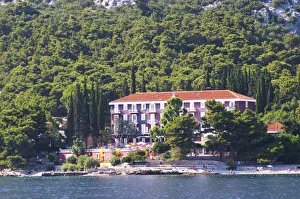 A beach hotel near the village. Orebic town, holiday resort on the south coast of A beach hotel near the village. Orebic town, holiday resort on the south coast of
