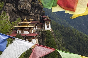 Bhutan, Paro. Taktsang Monastery, known as Tigers Nest hangs Bhutan, Paro. Taktsang Monastery, known as Tigers Nest hangs