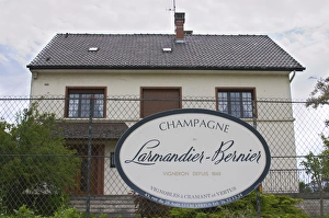 A big sign saying Champagne larmandier-Bernier, wine grower since 1849, vineyards in Cramant A big sign saying Champagne larmandier-Bernier, wine grower since 1849, vineyards in Cramant
