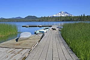 Boat docks at Lava Lake Resort Sister Mountain on Cascade Lakes National Scenic Byway Boat docks at Lava Lake Resort Sister Mountain on Cascade Lakes National Scenic Byway