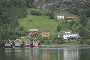 Boat houses in Beautiful Flam; situated in the innermost part of the Sognefjord surrounded Boat houses in Beautiful Flam; situated in the innermost part of the Sognefjord surrounded