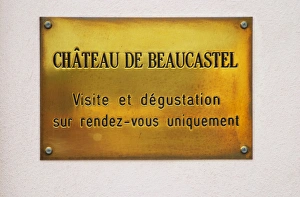 Brass plate at the entrance - visits and tastings on appointment only. Chateau de Beaucastel Brass plate at the entrance - visits and tastings on appointment only. Chateau de Beaucastel