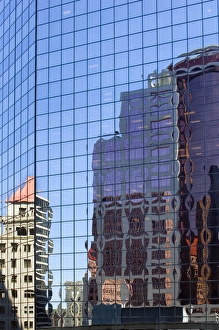 Buildings reflected in building in downtown Portland, Oregon Buildings reflected in building in downtown Portland, Oregon