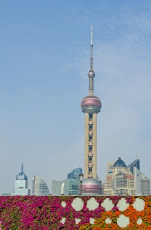 The Bund gardens with Pearl Tower over Pudong district skyline Shanghai, China The Bund gardens with Pearl Tower over Pudong district skyline Shanghai, China