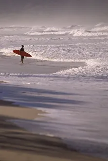 CA, Costa Rica, Nicoya Peninsula Surfer on Playa Santa Teresa CA, Costa Rica, Nicoya Peninsula Surfer on Playa Santa Teresa